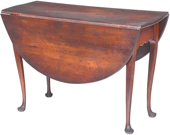 Queen Anne cherry drop-leaf table, 18th century, with two demilune drop-leaf ends, a scalloped apron, tapered legs, and pad feet, 28