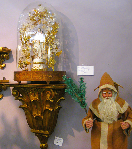 Betty Bell of Betty Bell Antiques, Dallas, Texas, is best known for high-quality seasonal antiques. This year she also brought this Old Paris porcelain Madonna and Child in a glass dome with an inlaid base, 18