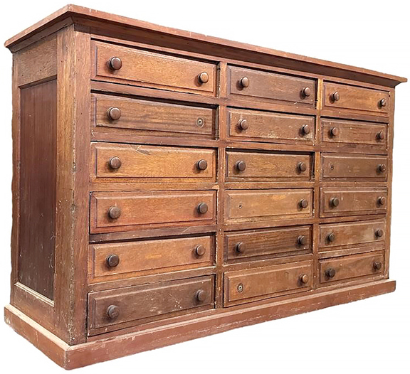 This large 18-drawer mahogany chest was likely used in a mercantile environment, perhaps for storage of textiles. The 41¼
