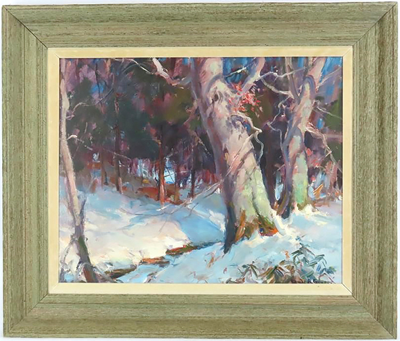 The framed oil on board by Emile A. Gruppé (1896-1978) depicts a stream running through a winter forest landscape. Signed lower right, the approximately 22