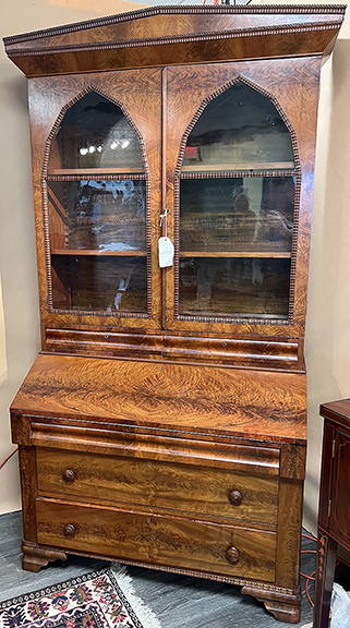 Rick Fleshman of Fleshman’s Antiques, New Market, Maryland, offered this imposing two-piece burl walnut secretary with rippled trim moldings for $1650. Purchased in Baltimore, this late Empire/early Victorian bookcase has beaded molding and can be transported by lifting the top off the base.