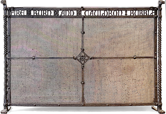 This Arts and Crafts wrought-iron fireplace screen, with a saying on the crest from Macbeth, “Fire Burn and Cauldron Bubble,” flanked by dragon heads and twisted shafts on paw feet, unsigned, 32