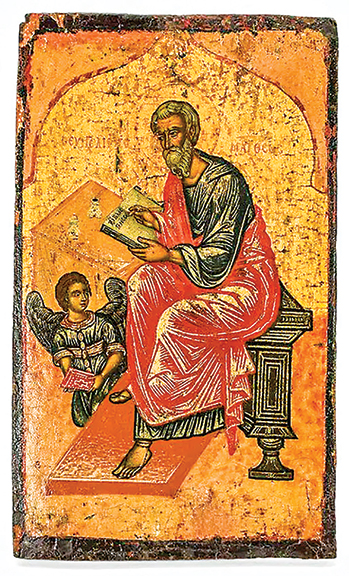 The Greek 19th-century icon-style painted wood panel depicts a scribe or holy man at a desk with an angel at his knee. Two words are written in the scribe’s book. The lettering behind the figure is illegible. The 16½