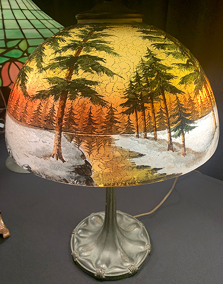 Jack Papadinis of Jack Pap Antiques, West Simsbury, Connecticut, sold this reverse- and obverse-painted lamp by Phoenix dating to 1910 for $1250 early in the show. “You don’t see this very often,” he said, referring to the painted winter scene with snow and a river.