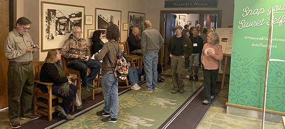 Stools and chairs outside the entrance to the National Arts and Crafts Shows at the Omni Grove Park Inn were grabbed as early as five hours before the 1 p.m. opening on February 16. The eventual line to enter snaked down the corridor but moved quickly.