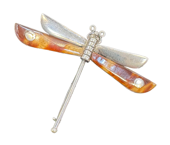 Elizabeth Yates Turner of Bremen, Maine, offered this Spratling dragonfly from the 1940s for $275. She has just opened a new shop, Bremen Meadow Antiques, in Bremen that&rsquo;s open Friday, Saturday, Sunday, and by appointment. Five local dealers have inventory in the new shop.