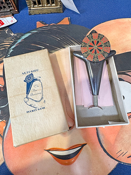 Autogiro, &ldquo;The New Fascinating Pocket Game,&rdquo; with original box and instructions, 1920s-30s, was $100 from Mike Gallant of Hometown Antiques, Glenburn, Maine. Potter Auctions, Chicago, Illinois, described it in a 2023 catalog listing: &ldquo;Hold the device with two fingers and press the lever with your thumb to spin the wheel.&rdquo;
