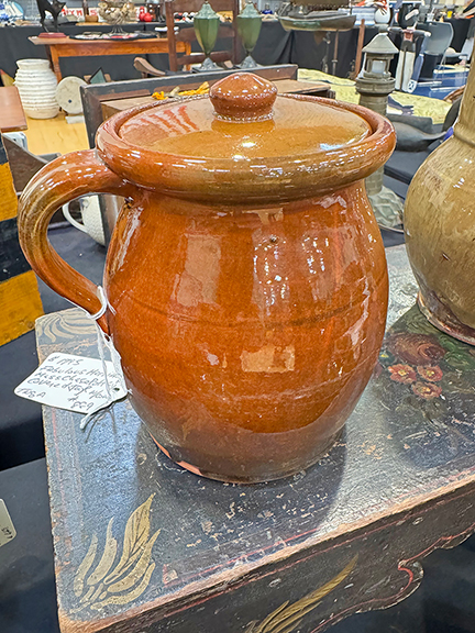 The redware lidded jar is in mint condition, said dealer Tom Goddard of Tom Goddard Antiques, Acton, Maine, who attributed it to the James Chase pottery of Merrimacport, Massachusetts. It came from a 40-year Maine collection, and was tagged $1795.