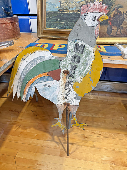 This folky polychrome double-sided sheet metal rooster, marked &ldquo;Moxcey,&rdquo; was $350 from Josh Farrin of Randolph, Maine.