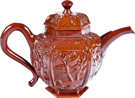 Topping all the Vander Sandes’ teapots was this very rare Staffordshire glazed redware teapot attributed to the shop of Samuel Bell of Pomona Works, Newcastle-under-Lyme. Each of the six arched panels has its own title, including “China Rock” and “Young Vice Roy of Kanton.” From the mid-18th century, the 5