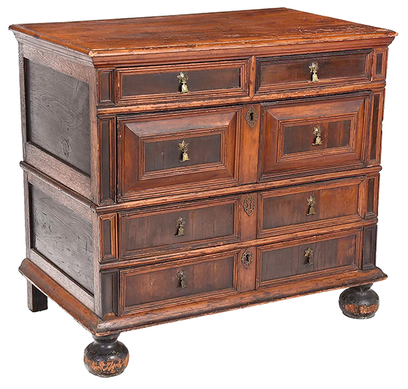 The catalog mentioned the “unusual construction” of this chest of drawers from 1670-1700 and attributed to the Mason and Messinger shop tradition of Boston. The cedar veneer and possibly rosewood panels are inset in frames and have central drawer pulls. The 35½