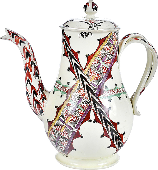 The colors and striking design of this Staffordshire covered coffeepot in a chintz pattern deserve to be seen by a large audience. It was possibly produced by the late 18th-century skilled artisans at the Robinson and Rhodes shop, Leeds, West Yorkshire, England. The 9½