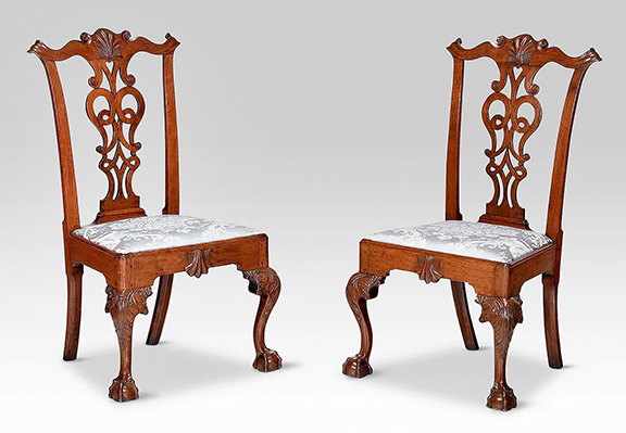 Photos of this pair of Pennsylvania Chippendale walnut side chairs were published in Albert Sack’s 1950 book, Fine Points of Furniture: Early American and in American Antiques from Israel Sack Collection, vol. III. Andrew Brunk referred to the interwoven strapwork and heart pierced splat as “an unusual design.” The 41