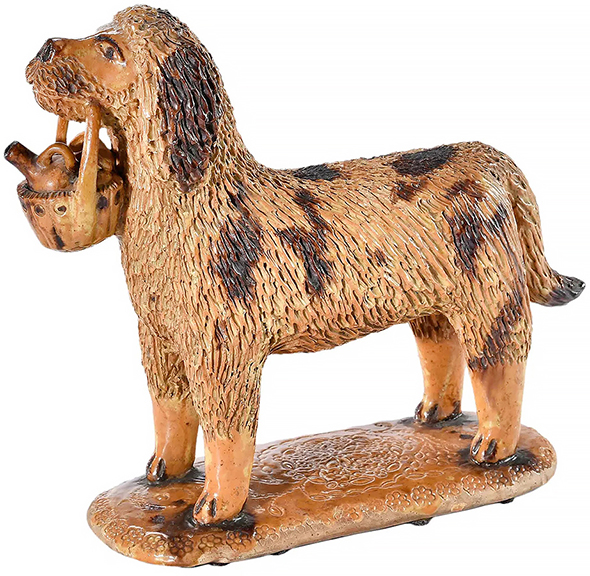 Brunk Auctions allocated a full page to this earthenware dog with basket attributed to John Bell Pottery, 1860-90. The Mangers included a photo of the 9½