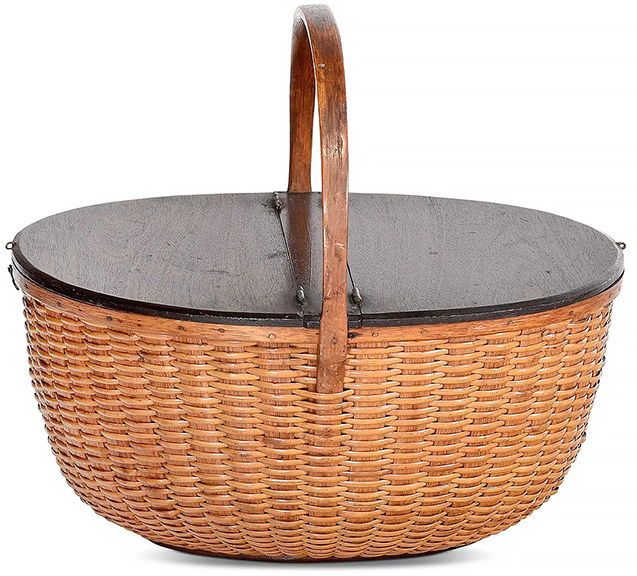 In Katherine and Edgar Seeler’s 1972 book, Nantucket Lightship Baskets, the caption for this double-lidded Nantucket lightship basket states that there is a note on the bottom that says it was made by “William Hadwen Hosier.” In the catalog, the partial label on the bottom reads “Ma--/Willia----dwin Hosier / Nantucket / Sold me by Mrs. Brown of / the Quaker Antique Shop.” The 15½