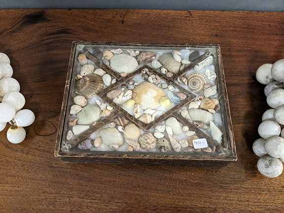 Bethany Kelly of BDK Antiques & Design, Limington, Maine, displayed this paint-decorated box of shells, akin to a sailor’s valentine. Some long-ago mystery mariner’s affection has been sealed, shut in it since circa 1830. It was $850.