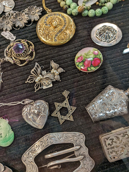 A selection of pendants, brooches, and other tempting sparkly objects from Massachusetts dealer Abroms Antiques & Jewelry. Prices at this booth ranged from $3.99 to $2850.