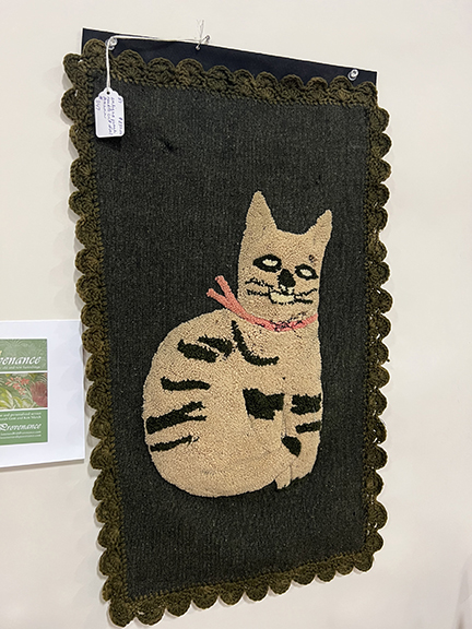 The wool punch needle cat was $250 from Interiors with Provenance, Granite Point (Biddeford), Maine, and Park City, Utah.