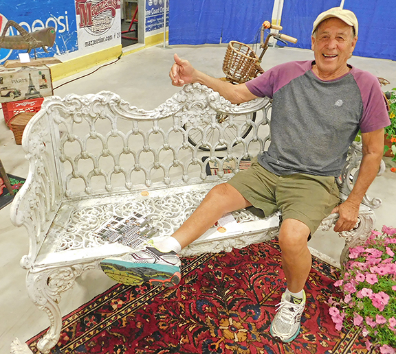 Joni Lima and Joe Spaider of Round Pond, Maine, are both on the rebound from serious bouts with illness. “It’s all behind us now,” Joni said. “We haven’t done a show in a whole year.” But now they’re back, with Joni relaxing on a white painted cast-iron garden bench by Molla in Georgian style, dating from the mid- 20th century. The asking price was $2800, and it was already sold when I took the shot.