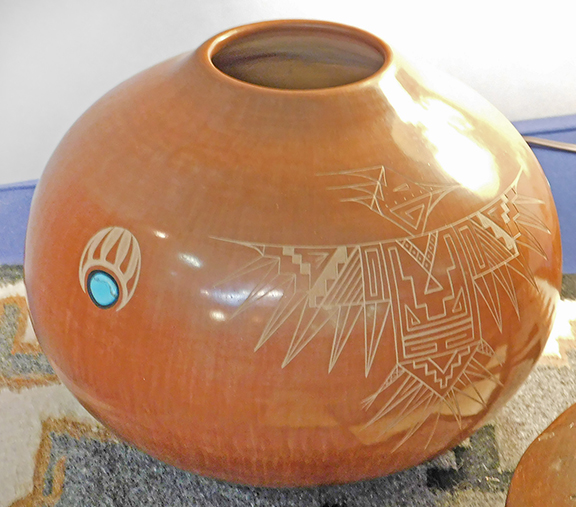 Greg Hamilton of Stone Block Antiques, Vergennes, Vermont, had a booth accented by both Mexican and Native American pottery. “I have two collections that I just bought recently,” he noted. This highly polished olla with inlaid turquoise and a sgraffito eagle, signed illegibly on the bottom,was $1100.