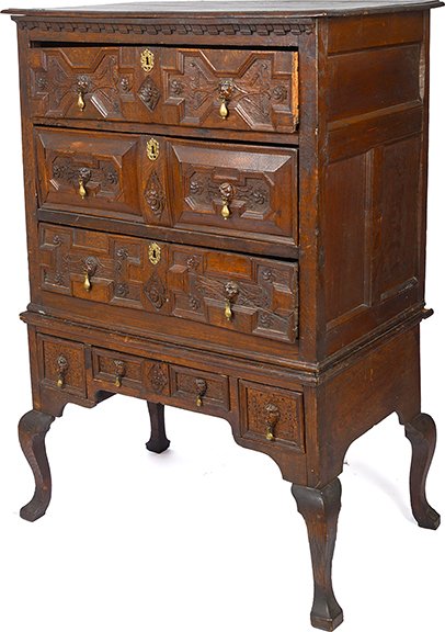 Here’s an early 18th-century carved oak chest-on-stand, 57½