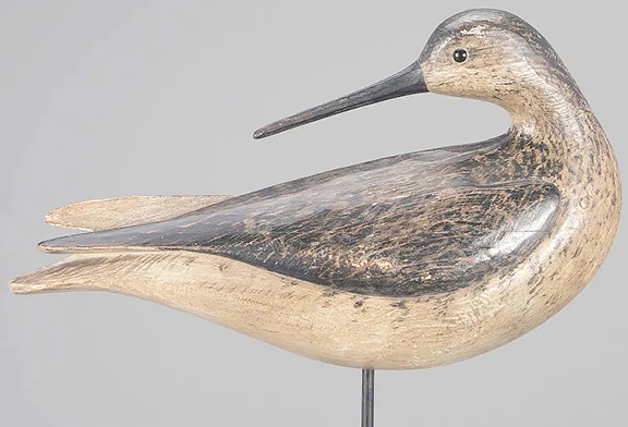 This preening willet by Mark S. McNair was made around 1980 with an inlaid raised wingtip and is signed on the underside. From the Kirby Roberts collection and estimated at $1500/2500, it realized $9000.