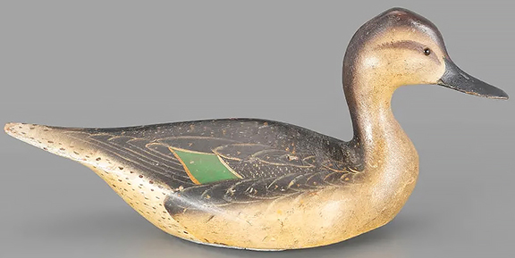 This celebrated pair of White Mallard Club pinch-breasted pintail decoys by brothers Lemuel Ward and Stephen Ward, circa 1932, each estimated at $80,000/120,000, sold separately; the drake (left) brought $108,000, and the hen, $103,200, for a total of $211,200. They were acquired from Abercrombie & Fitch by the White Mallard Club, Butte Sink, California. 