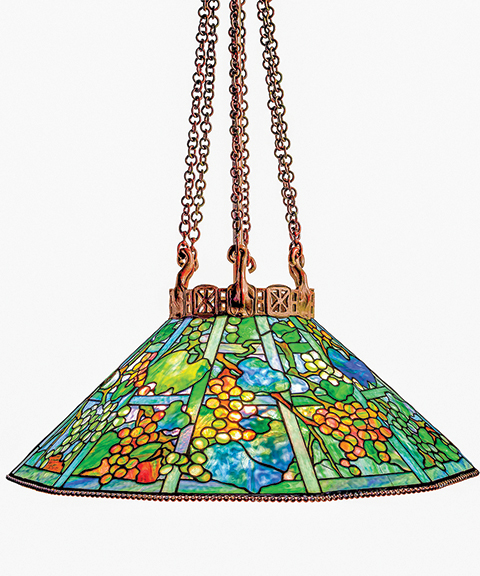 Tiffany Studios Grape Trellis chandelier, circa 1905, leaded glass and patinated bronze, shade impressed “Tiffany Studios New York,” shade diameter 30