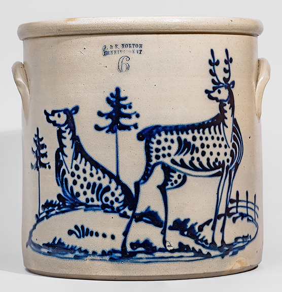 The six-gallon stoneware crock with a cobalt stag and doe scene, stamped &ldquo;J. & E. NORTON / BENNINGTON VT,&rdquo; circa 1855, sold for $72,000 (est. $30,000/50,000). The 13&frac34;