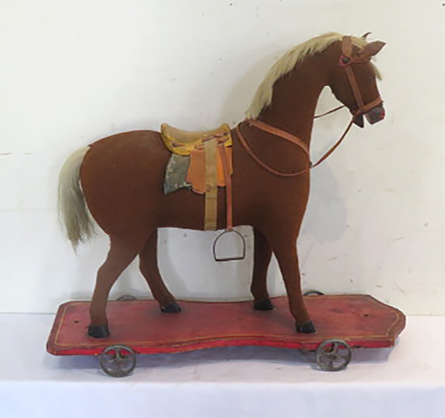 Horse on iron wheels