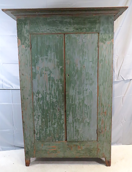 Green painted flat wall cupboard