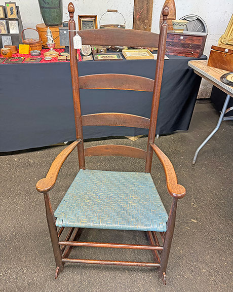 This Shaker rocking chair appears in Shaker Style (1995) by John S. Bowman. Steve Evans of Maynard, Massachusetts, asked $1250 for it.