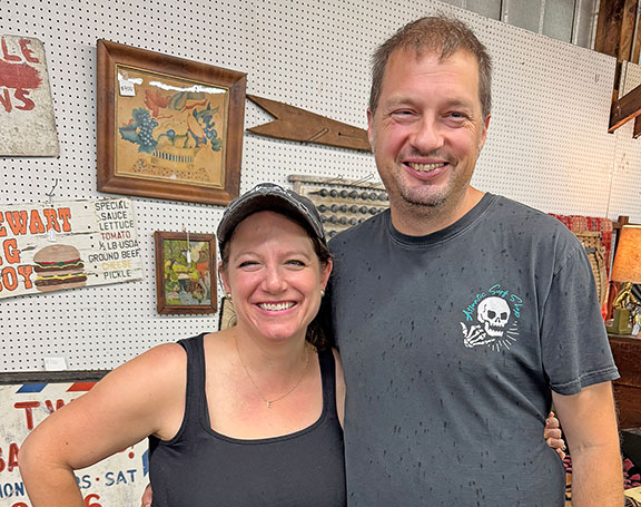 Dealers Matt Grieg and Emily Brandenburg tied the knot on June 6. Emily’s hat reads “Sorry about my husband.” The newly hitched couple from Milton, Delaware, offered several balloon molds from the early 20th century tagged $200 each.