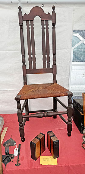 The Duxbury chair in original paint, branded “Livermore” was $600 from Richard Kenney of Exeter, New Hampshire. The early Paul Evans bookends in front were $300.