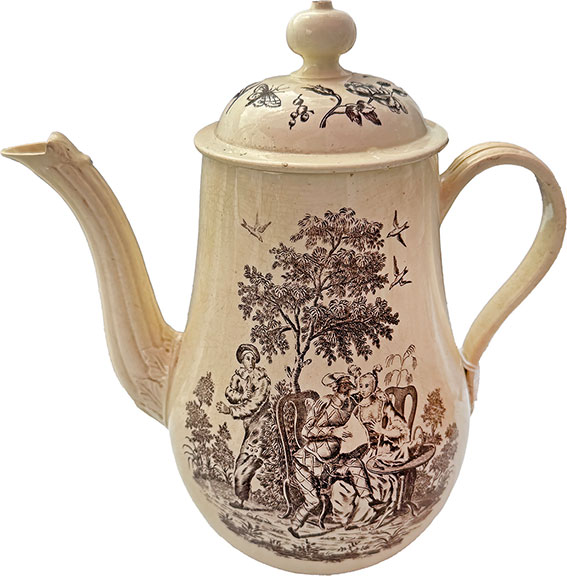 This creamware strapped-handle teapot featuring a tea party scene with a voyeur, 1790-1800, was $215 from Gregory Lovell Antiques, Hyde Park, Massachusetts.
