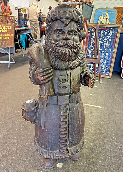 This 1920s Santa Claus papier-mâché mold from Bittner & Bock, Medford, New Jersey, was $2100, and it sold shortly after we took the photo. “Overall, we were pleased with the show. Our first apprehension for a successful show was gas prices. We were concerned that the cost to travel might hold some people back. During this show we normally meet and talk with people from all parts of the country. We noticed this year that it was more Northeastern shoppers. Then the rain—when the alerts started going off, we felt that it was a bad omen. In spite of the rain, the diehards came, shopped and spent money. I do think the two factors mentioned did make for a lighter crowd but we still did well enough to make the trip from New Jersey worthwhile. We were down about twenty percent from last year but that can happen under any circumstances. We think it’s a no frills, well run, fun show to do and wouldn’t miss it.”