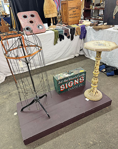 9 The Victorian skirt form was tagged $375; the sign painter’s box, “Tell the ‘World’ with Signs,” was $425; and the schoolgirl-decorated stand was $1800; all from Cottage+Camp, Millerton, New York.