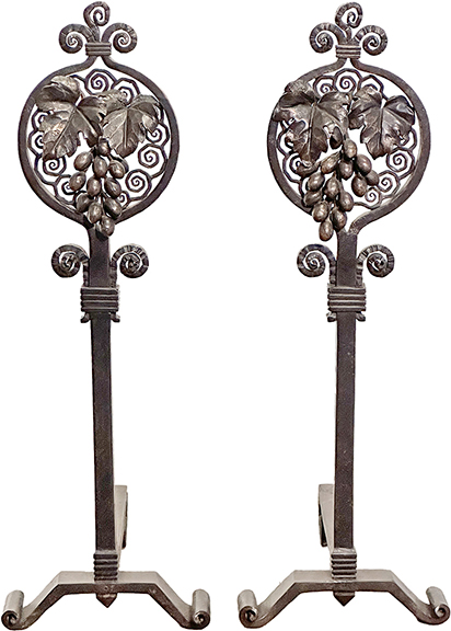 The handsome pair of wrought-iron andirons by French designer Edgar Brandt (1880-1960), each marked, “E. BRANDT,” from the first half of the 20th century, standing 27¾