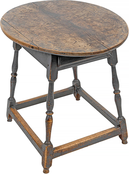 Circa 1730 New England maple and figured maple tavern table with older, possibly original, reddish-brown walnut stain under later blue-gray paint, two-board top, apron with canted sides matching the angle of the splayed turned legs, and single drawer. Measuring 26