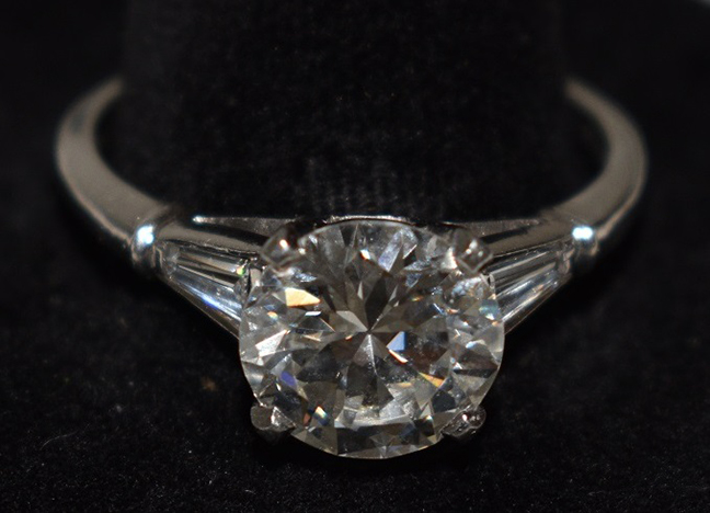 Exceptional Art Deco platinum/diamond ring with 3.07 ct. center stone w/2 trilliant diamond side stones, c. 1929, size 10½ .