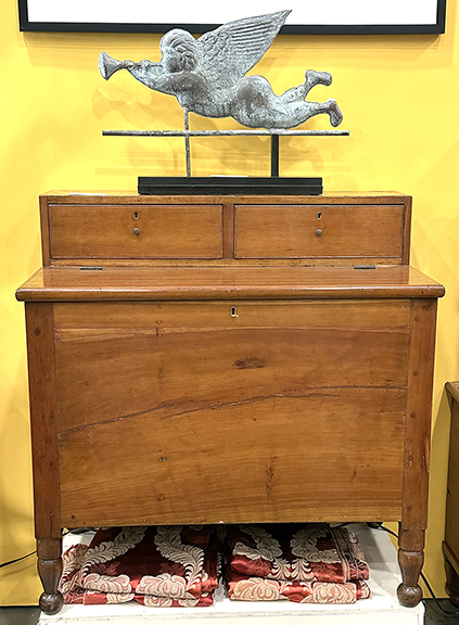 This sugar chest in cherry from Williamson County, Tennessee, has two spice drawers and turned legs with ball feet. Of dovetailed and pegged construction and with a green-painted interior, it dates to the 1850s and was out of a collection in Lexington, Kentucky. It measures 35¾