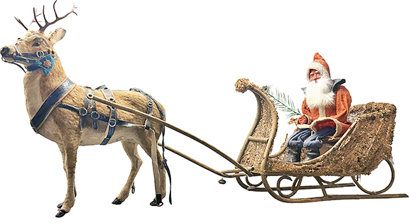 Cory Adams of Holiday Happenings, Tampa, Florida, offered this Santa Claus and reindeer with a loofah sleigh, German, early 1900s, approximately 26