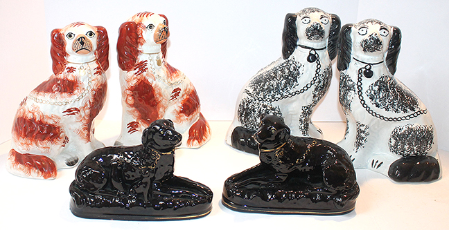 Many pieces of Staffordshire including these pairs of spaniels in red & black plus a pair of Jackfield reclining dogs with pups.