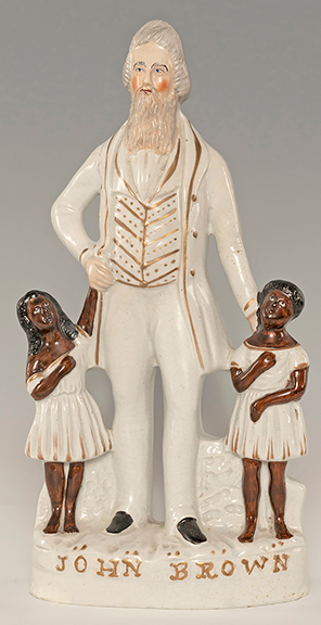 This Staffordshire figure of abolitionist John Brown with two black children, 11