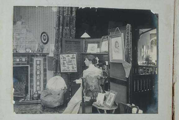  These two images from a 19th-century photo album offer a glimpse into late Victorian upper-class life at Ashburton House, Putney Heath, in southwest London. The photos show members of the John Carlisle family and details of the Elizabethan-style house and grounds. The unidentified woman seated in the interior scene is surrounded by the elements of her everyday world. The leather-covered album with 38 photos sold for $375 (est. $80/120).