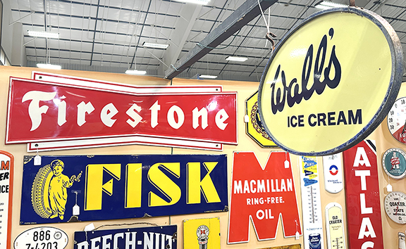 A late cancellation allowed Mark and Keely Richardson of Big Lick Antiques to take an extra booth. They filled the space with advertising signs and petroliana—a different look for the show. The Firestone single-sided porcelain-over-steel sign, 23½