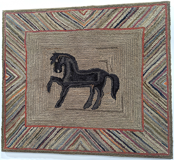 This 19th-century hooked rug featuring a black horse was priced at $4200 by Newsom & Berdan Antiques & Folk Art, Abbottstown, Pennsylvania.