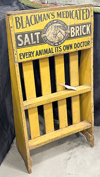 Blackman’s Medicated Salt Brick display, wood, with mustard paint and a tin panel, 28