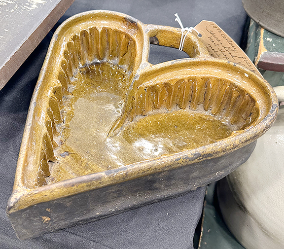 Heart-shaped redware mold, 3