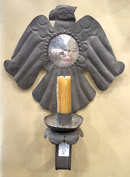 Tin eagle sconce with a mirror back, 12